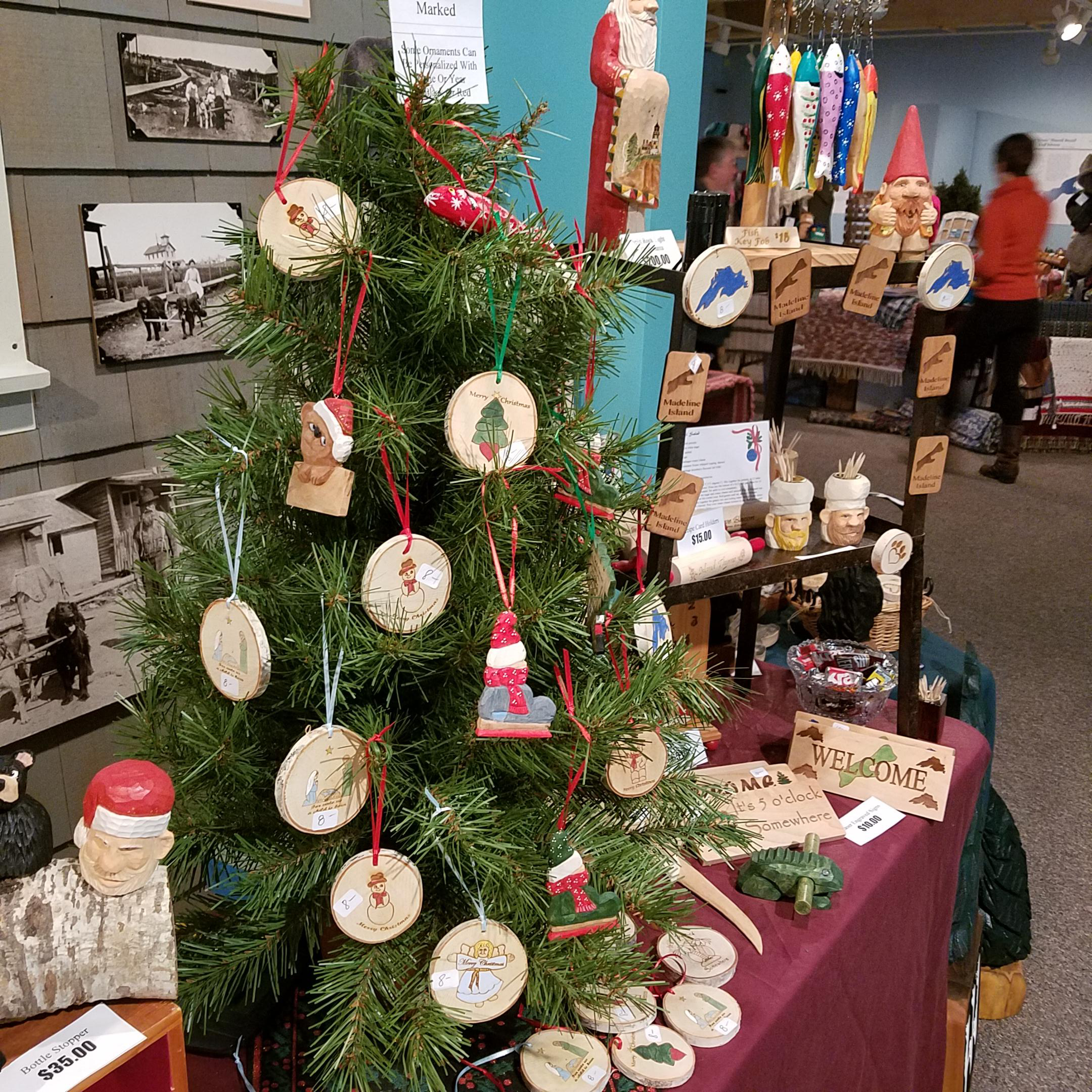 A small Christmas tree decorated with ornaments